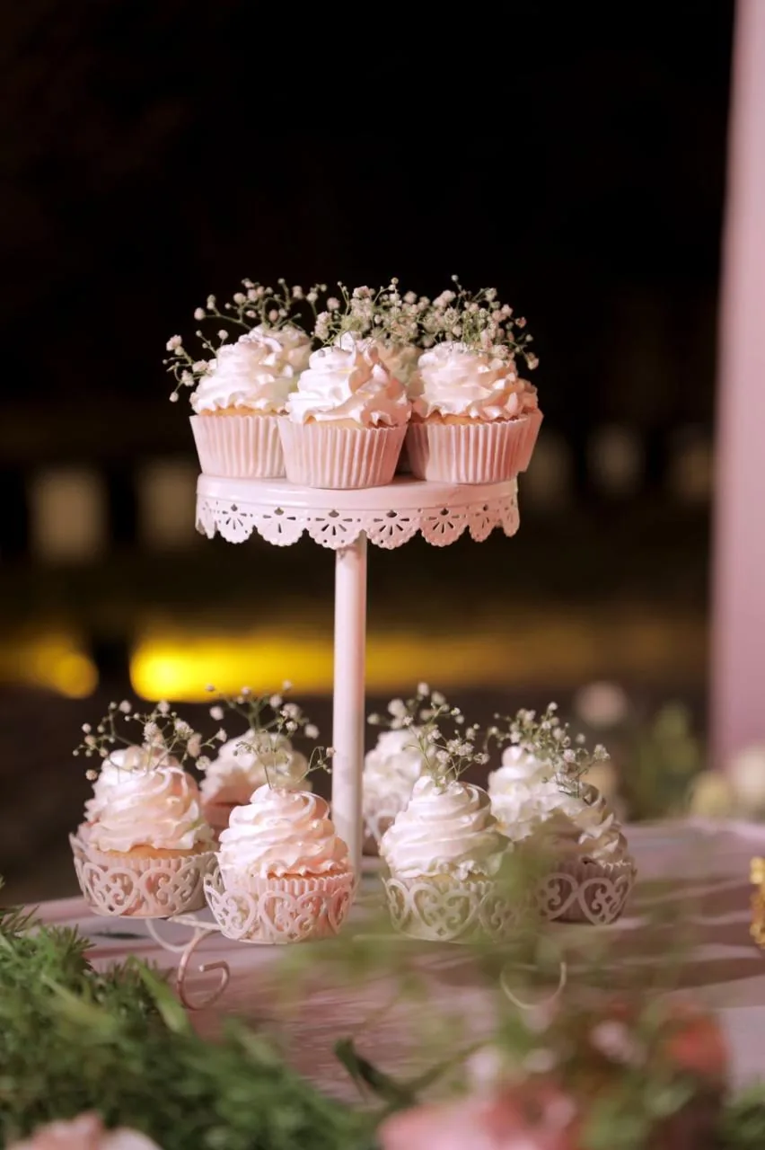 Cupcakes on dessert table by Simply Sweet Udaipur