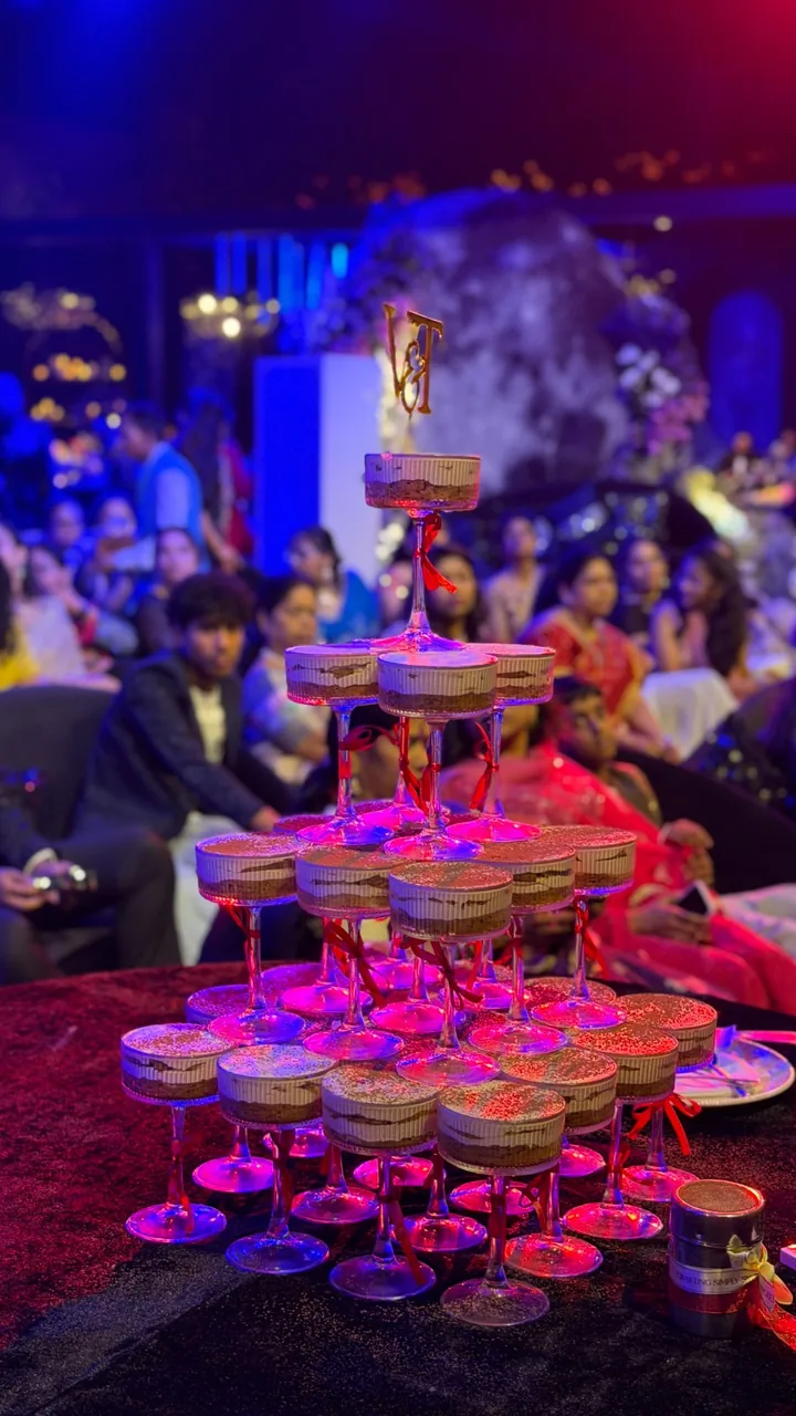 Tiered dessert tower for a wedding reception by Simply Sweet Udaipur
