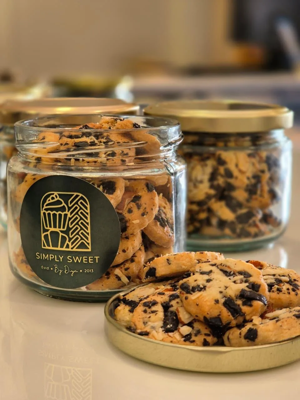 Eggless cookies packed in branded gift jars by Simply Sweet Udaipur