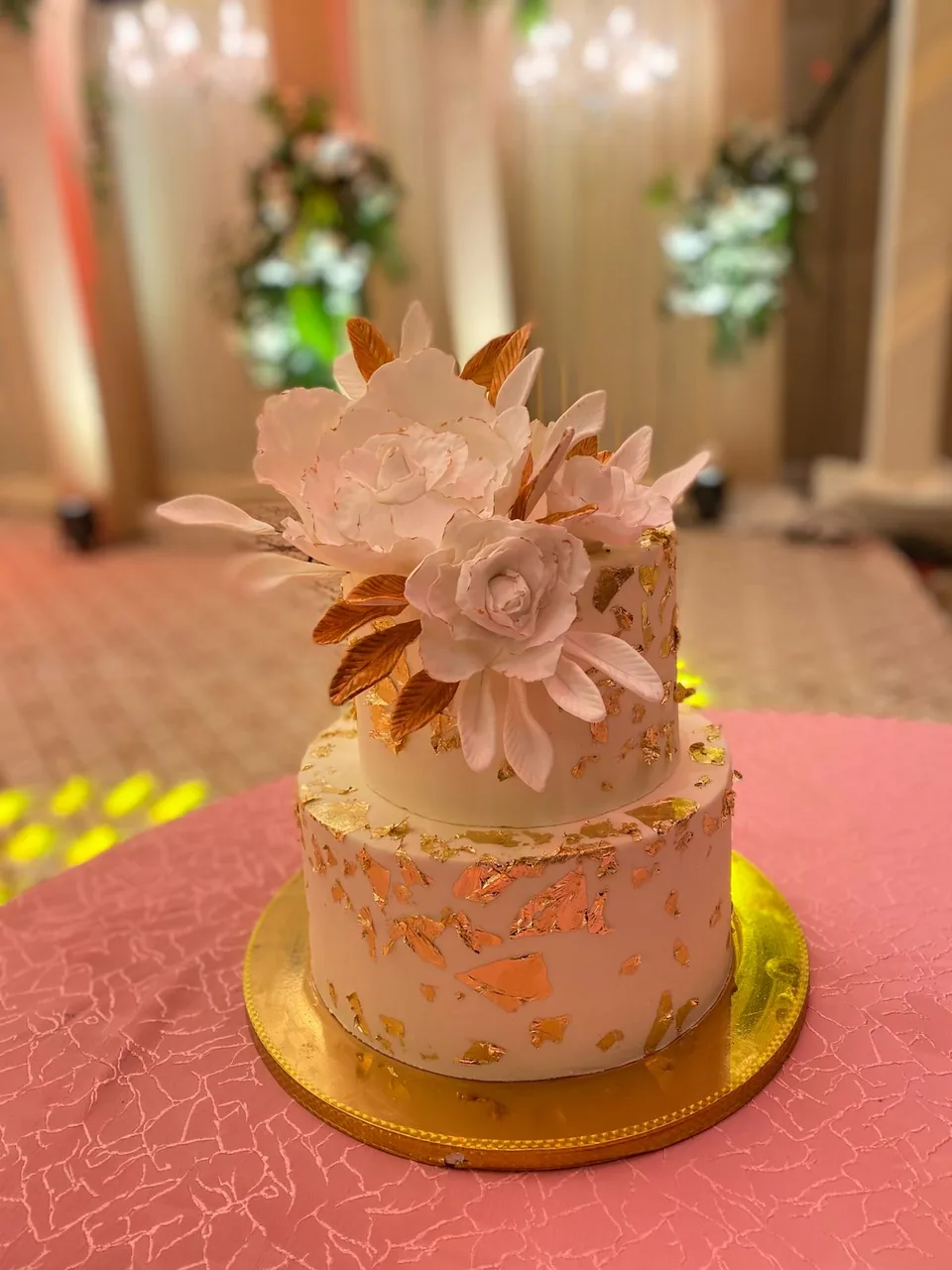 Designer cake with handmade sugar flowers and gold leaf by Simply Sweet Udaipur