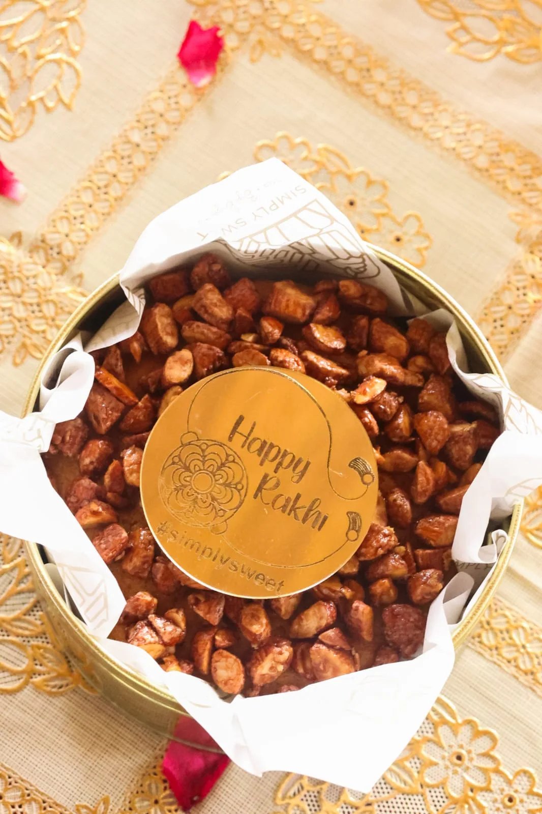 Rakhi dry fruits tin by Simply Sweet Udaipur