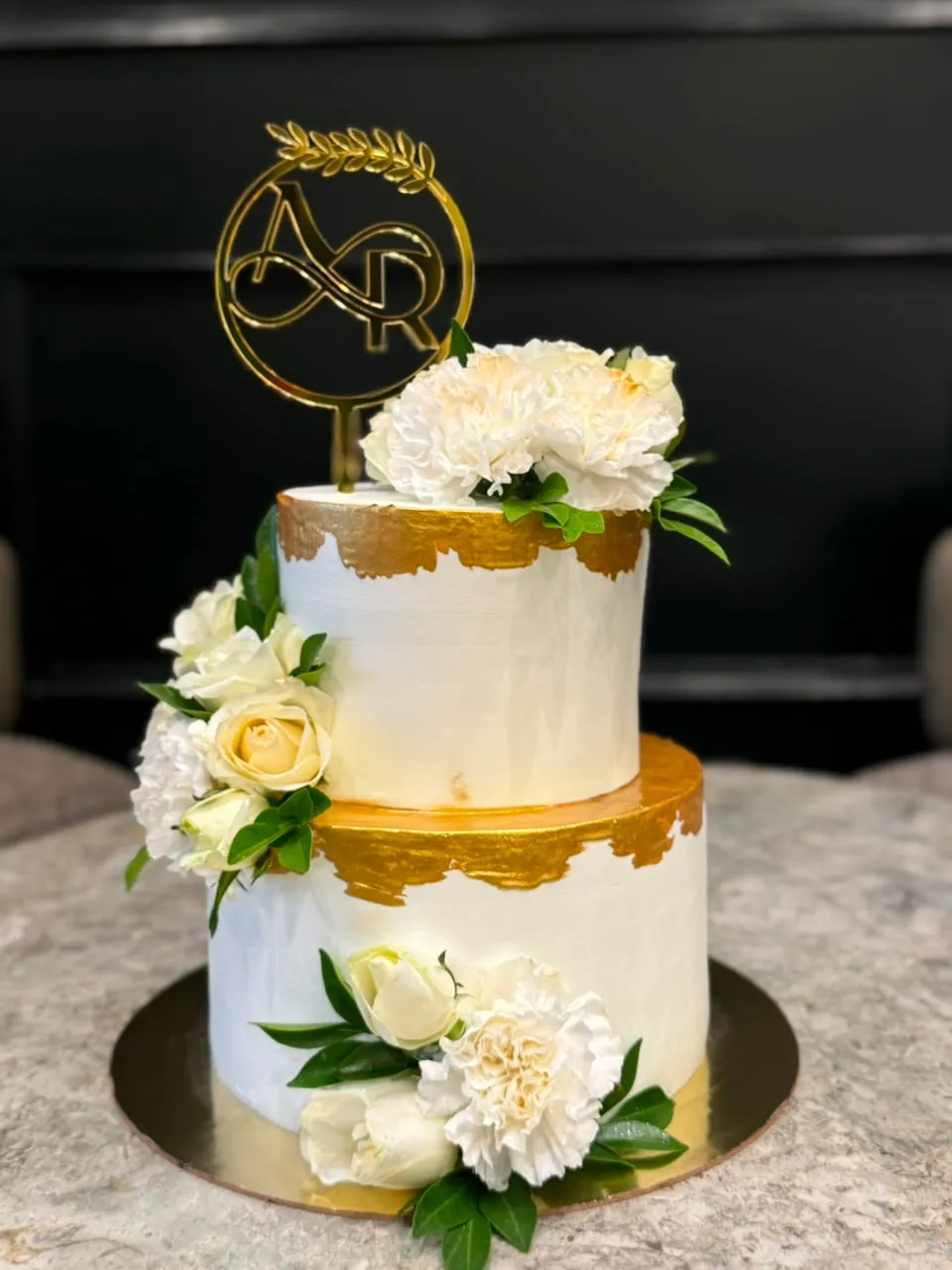 Three-tier destination wedding cake crafted by Simply Sweet for a heritage haveli celebration in Udaipur