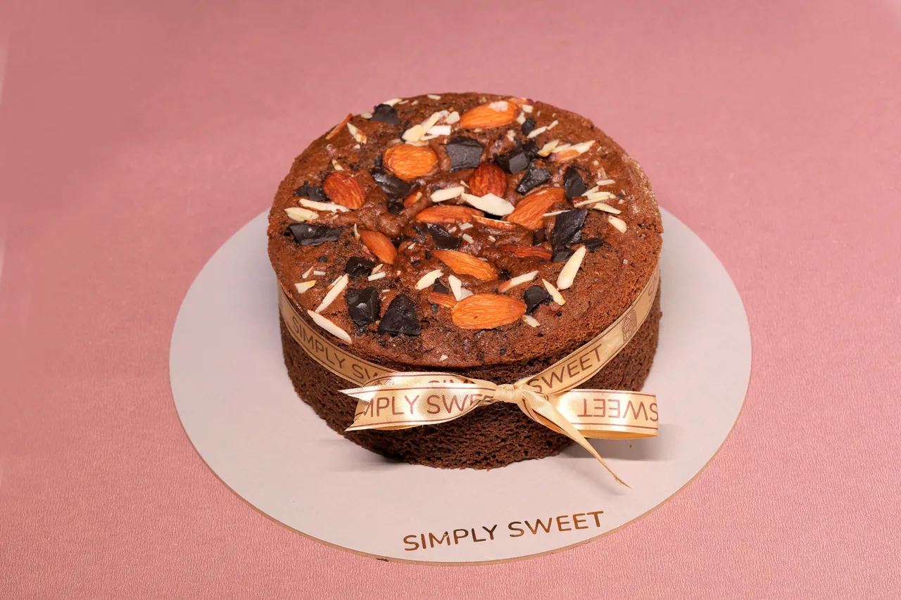 Sugar free chocolate truffle cake with almonds by Simply Sweet Udaipur